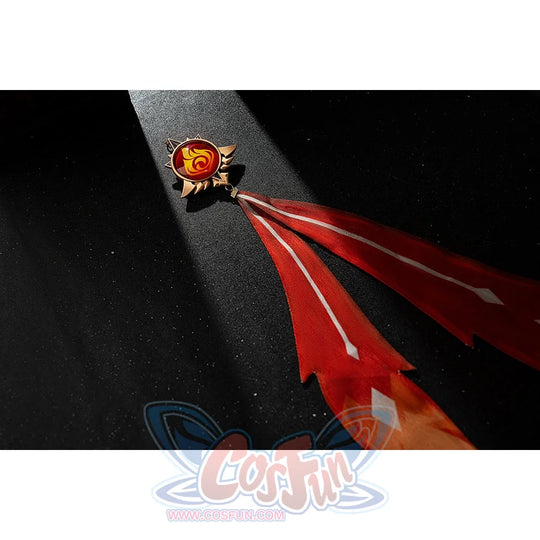 Genshin Impact Amber cosplay vision tassel detail shows red ribbons fading into an orange flame shape.