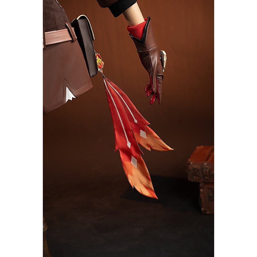 Genshin Impact Amber cosplay vision tassel side view drops beside the red coat and glove cuff.