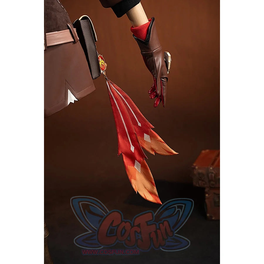 Genshin Impact Amber cosplay vision tassel side view drops beside the red coat and glove cuff.