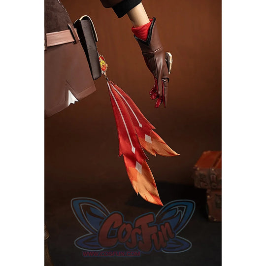 Genshin Impact Amber cosplay vision tassel side view drops beside the red coat and glove cuff.