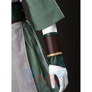 Arm guard close-up of Toph Beifong cosplay costume from Avatar with green glove, brown cuff, and gold trim