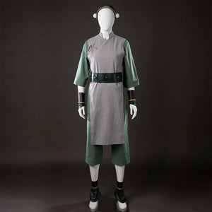 Front view of Toph Beifong cosplay costume from Avatar with gray tunic, green sleeves, belt, headband, and shoe covers