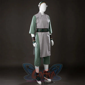Front angled view of Toph Beifong cosplay costume from Avatar with headband, gray wrap tunic, green sleeves, and belt