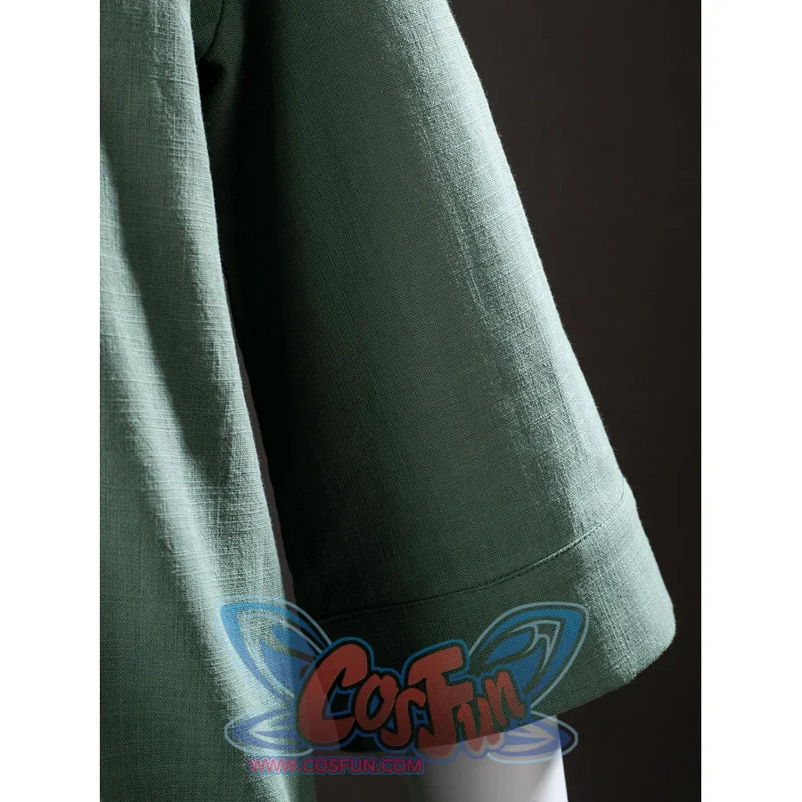 Sleeve close-up of Toph Beifong cosplay costume from Avatar green jacket showing woven texture and hem stitching