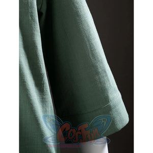 Sleeve close-up of Toph Beifong cosplay costume from Avatar green jacket showing woven texture and hem stitching