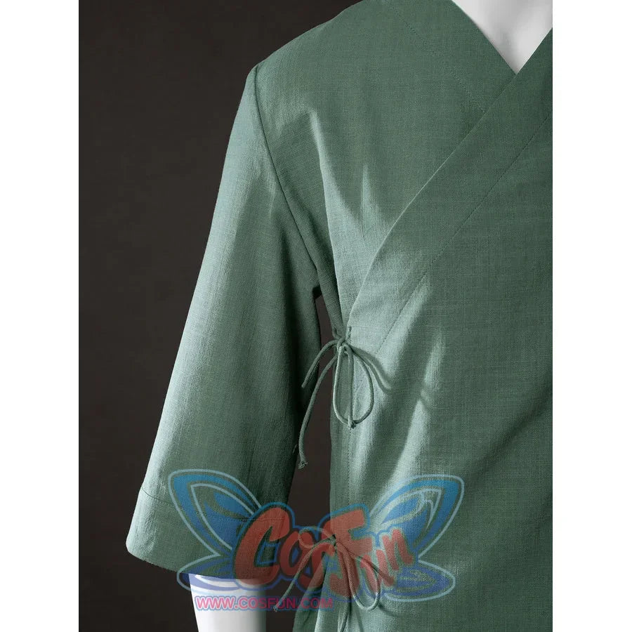 Close-up of Toph Beifong cosplay costume from Avatar green jacket wrap front with side ties and sleeve opening