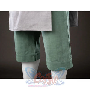 Pants hem close-up of Toph Beifong cosplay costume from Avatar showing green cropped legs and gray tunic edge