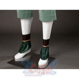 Shoe cover close-up of Toph Beifong cosplay costume from Avatar with green wraps, brown cuffs, and gold trim