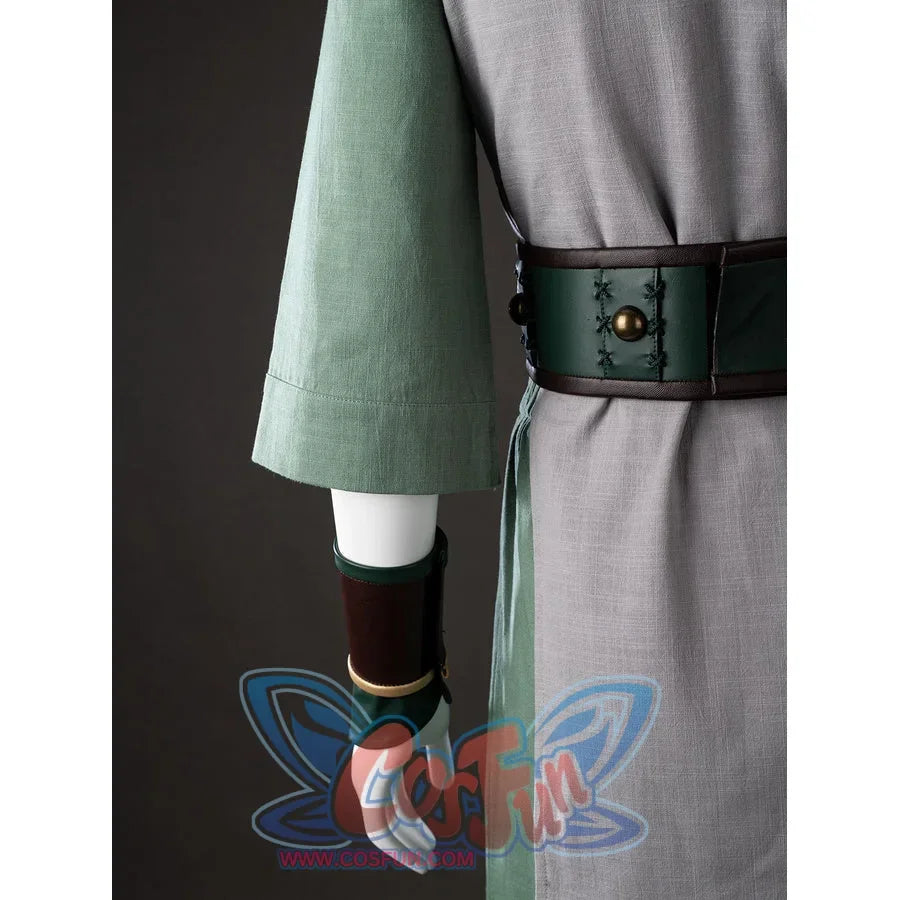 Side waist close-up of Toph Beifong cosplay costume from Avatar with green sleeve, arm guard, belt, and gray tunic