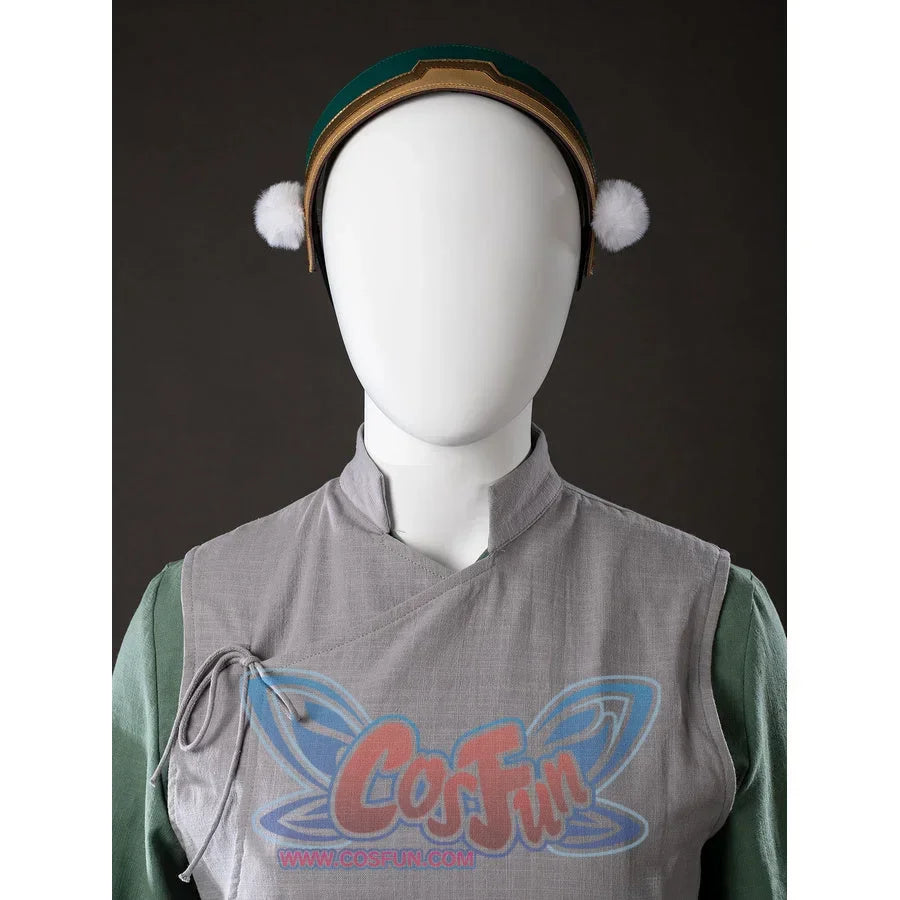 Upper front view of Toph Beifong cosplay costume from Avatar with headband, gray tunic, green sleeves, and side tie