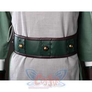 Waist close-up of Toph Beifong cosplay costume from Avatar with green belt, bronze studs, gray tunic, and side trim