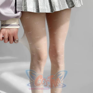 Beige sheer summer tights with bow patterns worn under metallic skirt, Lolita fashion style