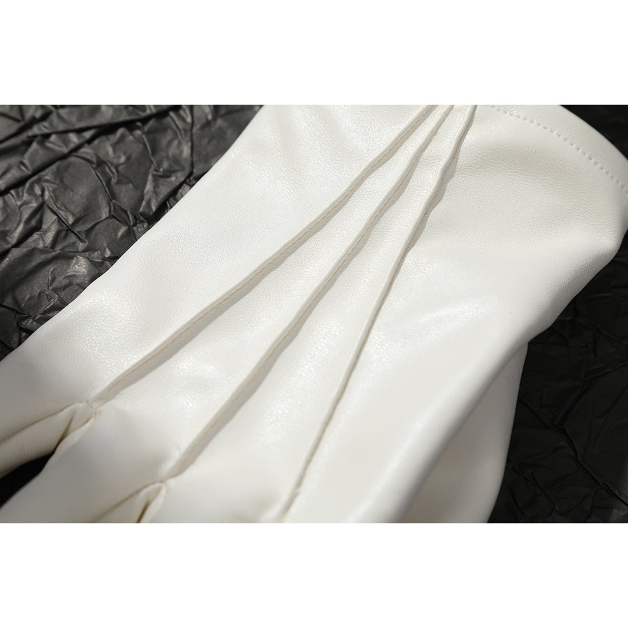 Buggy the Star Clown cosplay glove detail focuses on white fingers edged by narrow seam lines