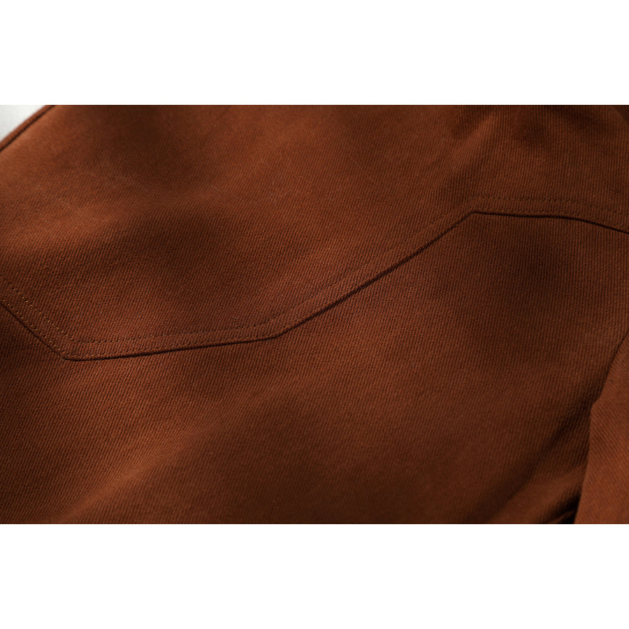 Buggy the Star Clown cosplay pants detail highlights a curved pocket seam in brown fabric
