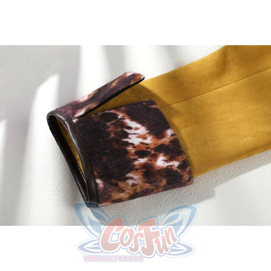 Buggy the Star Clown cosplay coat cuff detail pairs yellow fabric with a dark patterned wrist guard