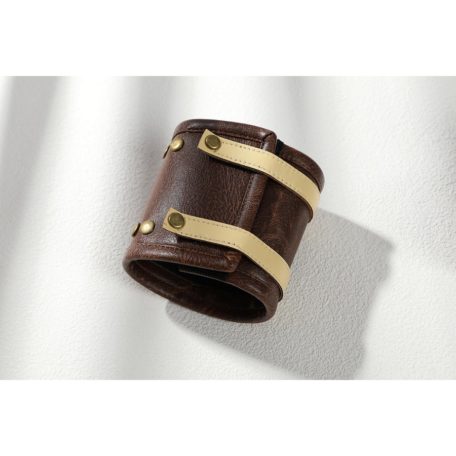 Buggy the Star Clown cosplay wrist guard close-up shows brown faux leather texture and cream bands