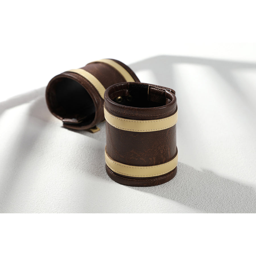 Buggy the Star Clown cosplay wrist guards pair shows dark brown cuffs accented by cream bands