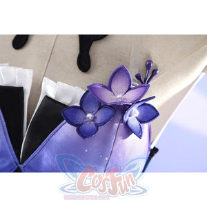 Chest close-up of Castorice cosplay costume with purple flower accents, black trim, and white ruffle neckline