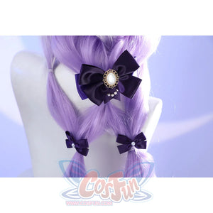 Close-up of Castorice cosplay costume back hair bow with purple ribbon, pearl center, and small butterfly bows