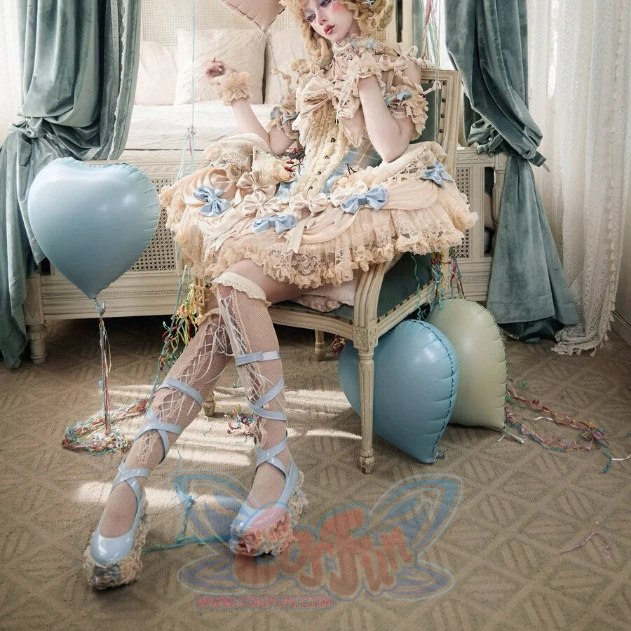 Seated styling showing the Lace Bow Skirt item with layered ruffles and blue ribbon accents