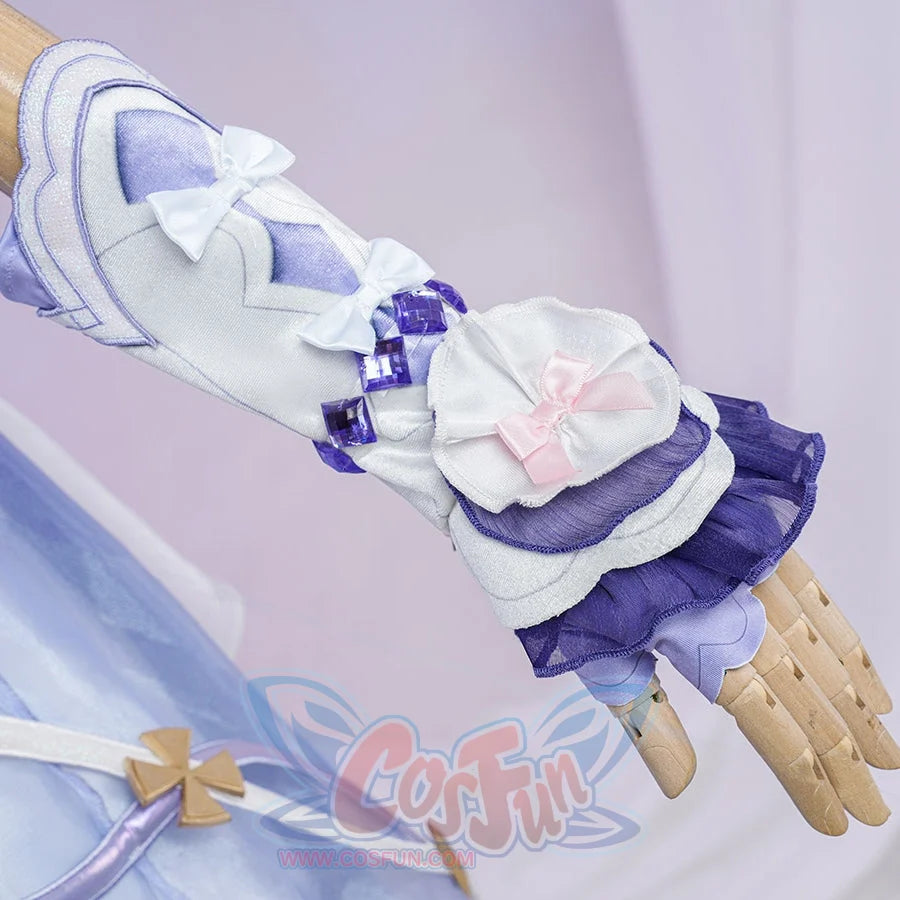 Genshin Impact Citlali Whispers of Stars and Smoke cosplay costume sleeve beside purple ruffles and pink ribbon accents.