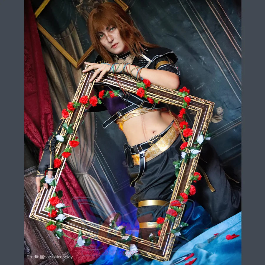 Clair Obscur: Expedition 33 Sciel cosplay costume angled pose frames the cropped top above strapped black trousers.