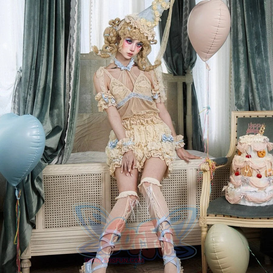 Seated styling showing the pumpkin bloomers with lace-trimmed leg openings