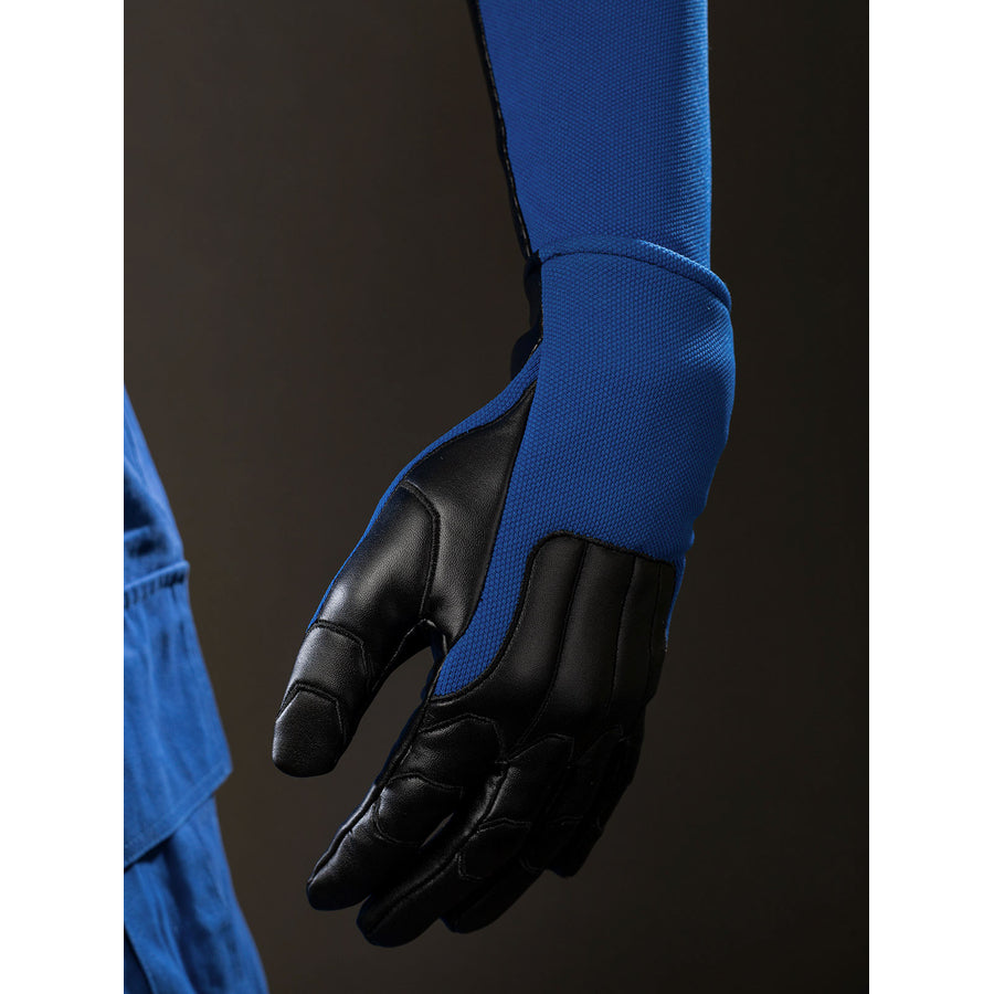 Cyclops Scott Summers cosplay glove close-up frames black fingers beneath a blue sleeve.