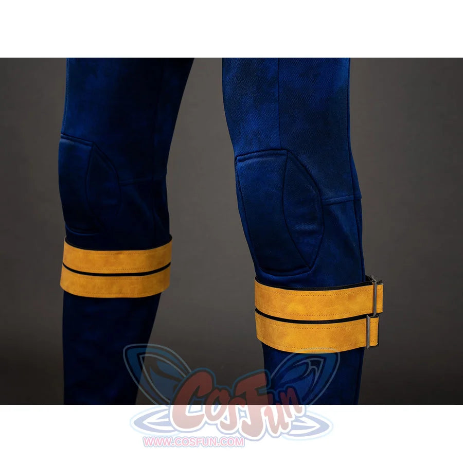 Cyclops cosplay leg band detail wraps yellow straps around the blue lower legs over clean panel lines.