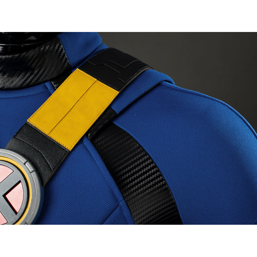 Cyclops Scott Summers cosplay shoulder harness detail sets yellow straps over black ribbed panels.