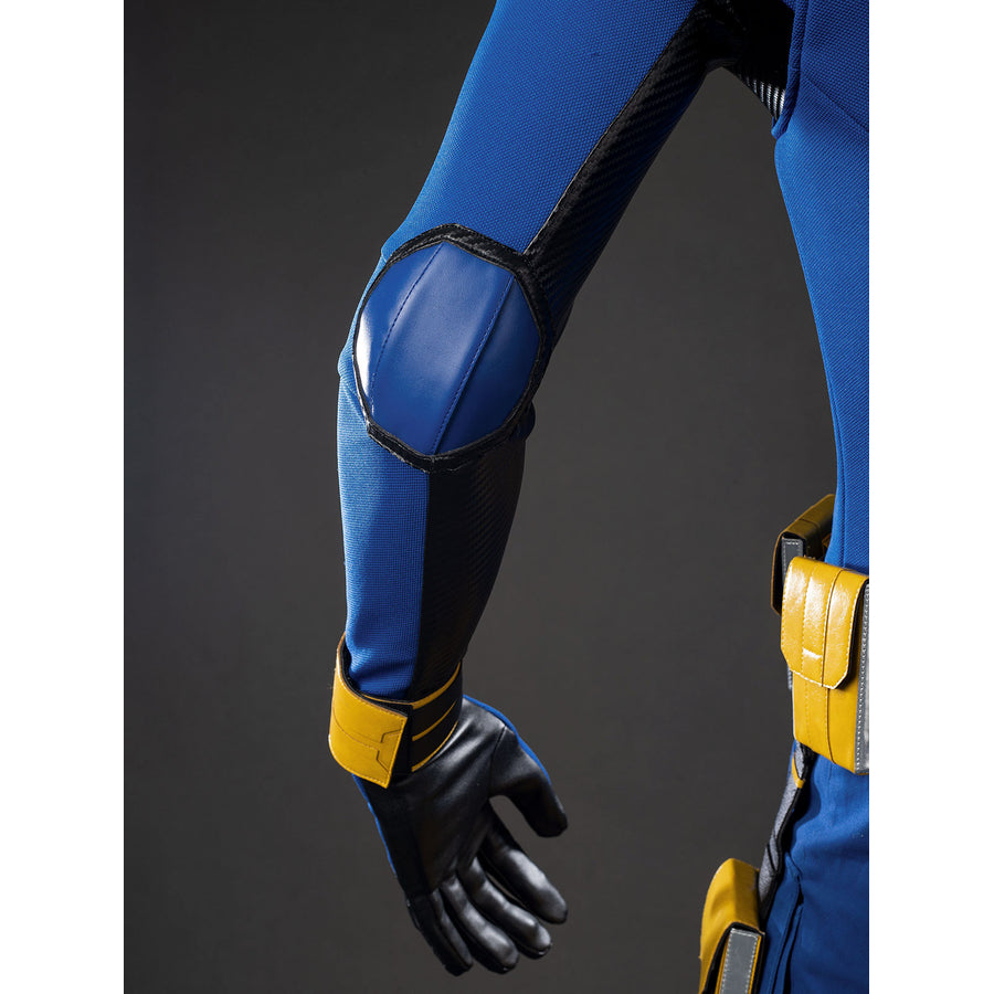 Cyclops Scott Summers cosplay sleeve detail centers a blue elbow pad between black side panels.
