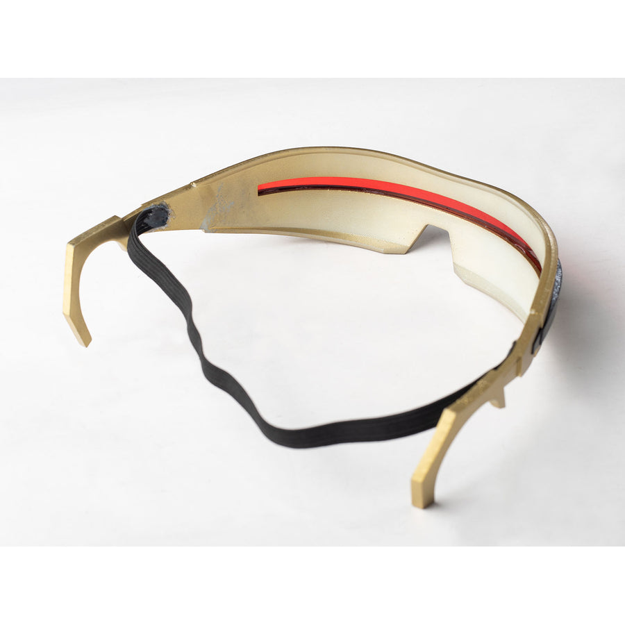 Cyclops Scott Summers cosplay glasses side view traces the gold-tone visor frame and black strap.