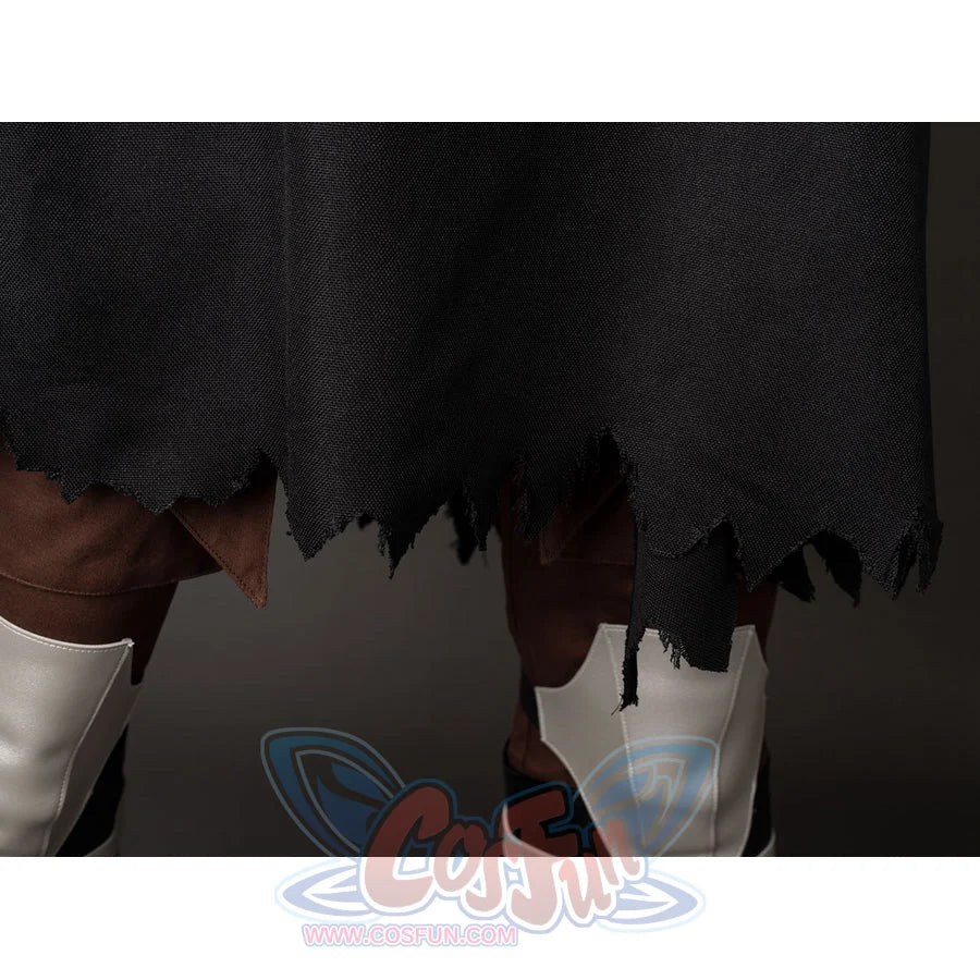 Darth Maul cosplay cloak hem detail cuts a ragged black edge above brown pants and white leg guards.