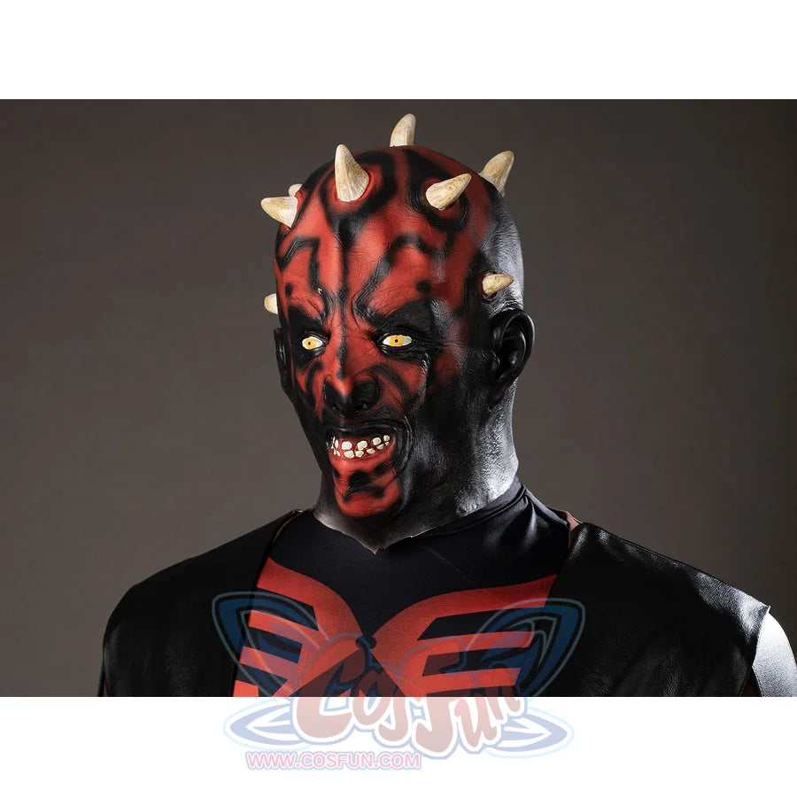 Darth Maul cosplay latex headpiece close-up sharpens red face markings, small horns, and yellow eyes.