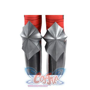 Diana Prince cosplay lower leg armor detail centers silver knee plates over black shin guards