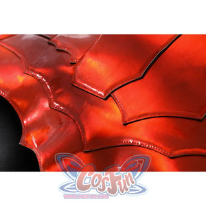 Diana Prince cosplay red armor close-up catches glossy segmented panels divided by black seam lines