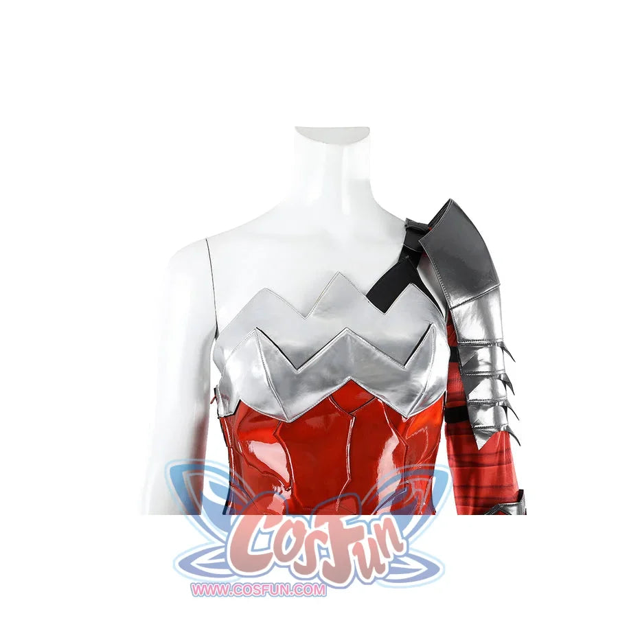 Diana Prince cosplay upper costume detail frames silver chest armor beside a single armored sleeve