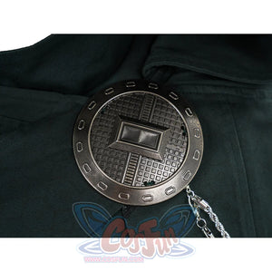 Doctor Doom cosplay cape clasp detail with a round dark ornament and silver-tone chains.