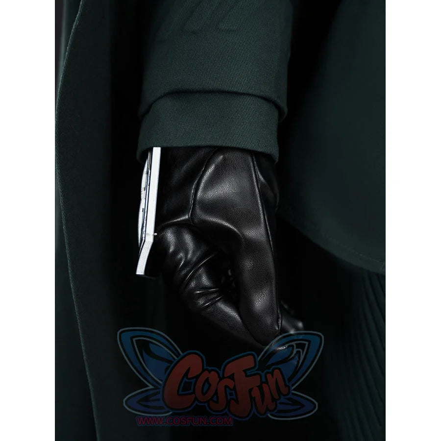 Doctor Doom cosplay glove detail with a silver-tone cuff piece beneath the green sleeve.