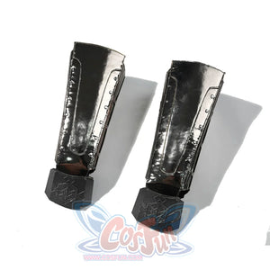 Doctor Doom cosplay metal prop pair flat lay with reflective panels and angular tabs.