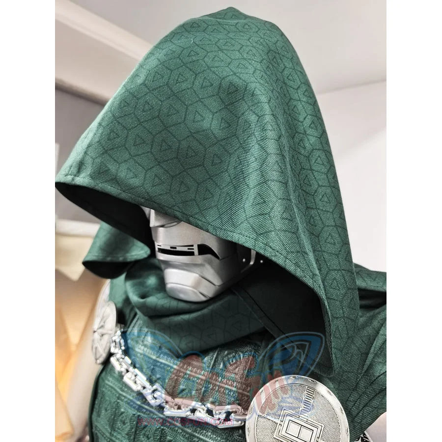 Doctor Doom cosplay costume layers a textured green fabric hood over a metallic face mask and intricate shoulder armor.