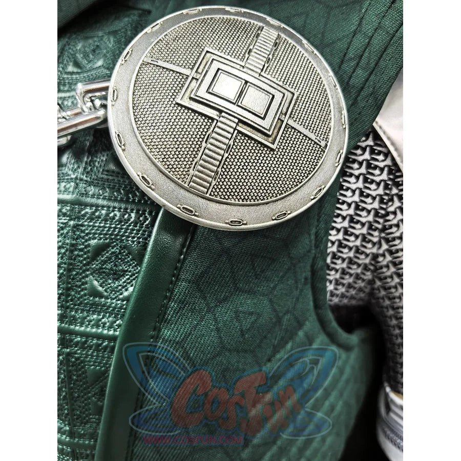 Doctor Doom cosplay costume presents a metallic circular chest emblem anchored to a textured green fabric base layer.