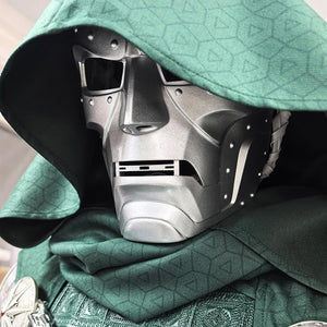 COSFUN Doctor Doom cosplay mask frames the metallic silver-tone facial structure beneath a detailed green patterned hood.