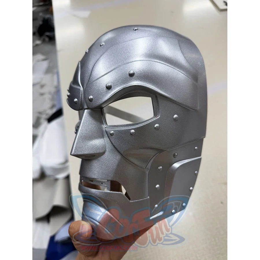Doctor Doom cosplay mask curves around the face with distinct silver-tone panel layers and bolted metal aesthetic details.