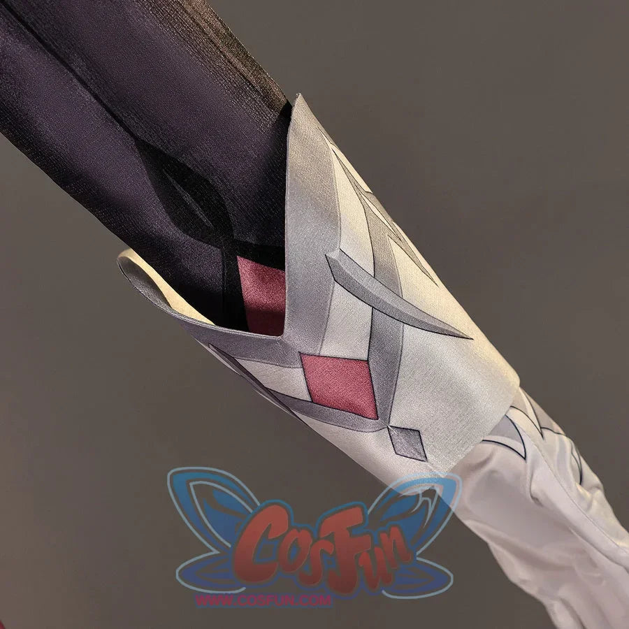 Close-up of Genshin Impact Durin cosplay costume silver sleeve guard with black fabric, red inset, and white glove