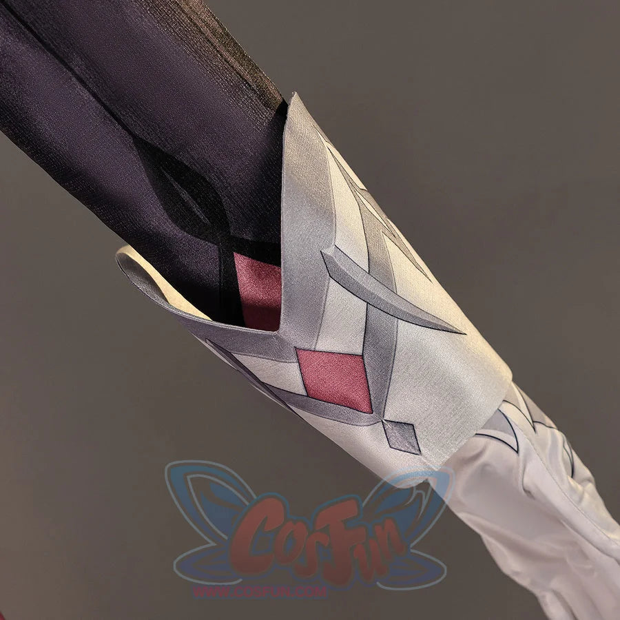Close-up of Genshin Impact Durin cosplay costume silver sleeve guard with black fabric, red inset, and white glove