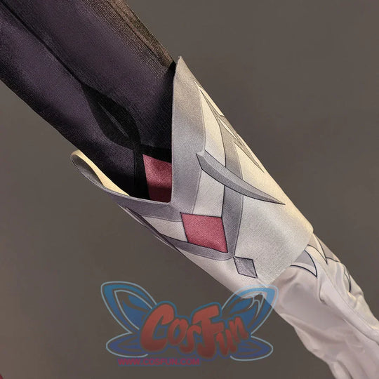 Close-up of Genshin Impact Durin cosplay costume silver sleeve guard with black fabric, red inset, and white glove
