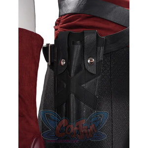 Elektra cosplay costume anchors a black faux leather arm sheath strap against a textured red bodysuit and glove sleeve.