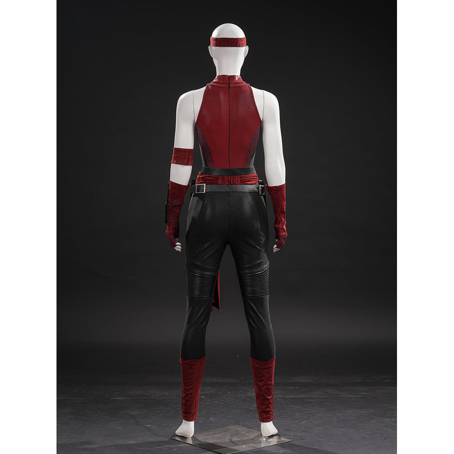 Elektra cosplay costume traces the back of the textured bodysuit with red panels and black faux leather leg guards.