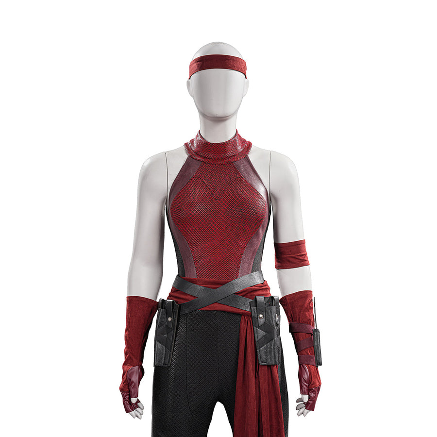 Elektra cosplay costume layers red textured bodysuit with a dark waist sash and tactical faux leather utility belts.